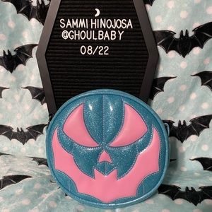 Love Pain and Stitches sweet tooth mini bat mouth